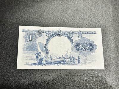 《外钞收藏家》第五百四十七期（本期稀少裸币、刀币、精品评级）（本平台长期征集拍品、欢迎藏友们联系合作） 1959年英属马来亚1元 非全新 品相如图 尾19