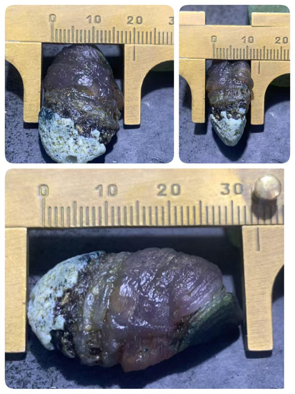 精美罕见紫罗兰料绿眼石原石一颗，
