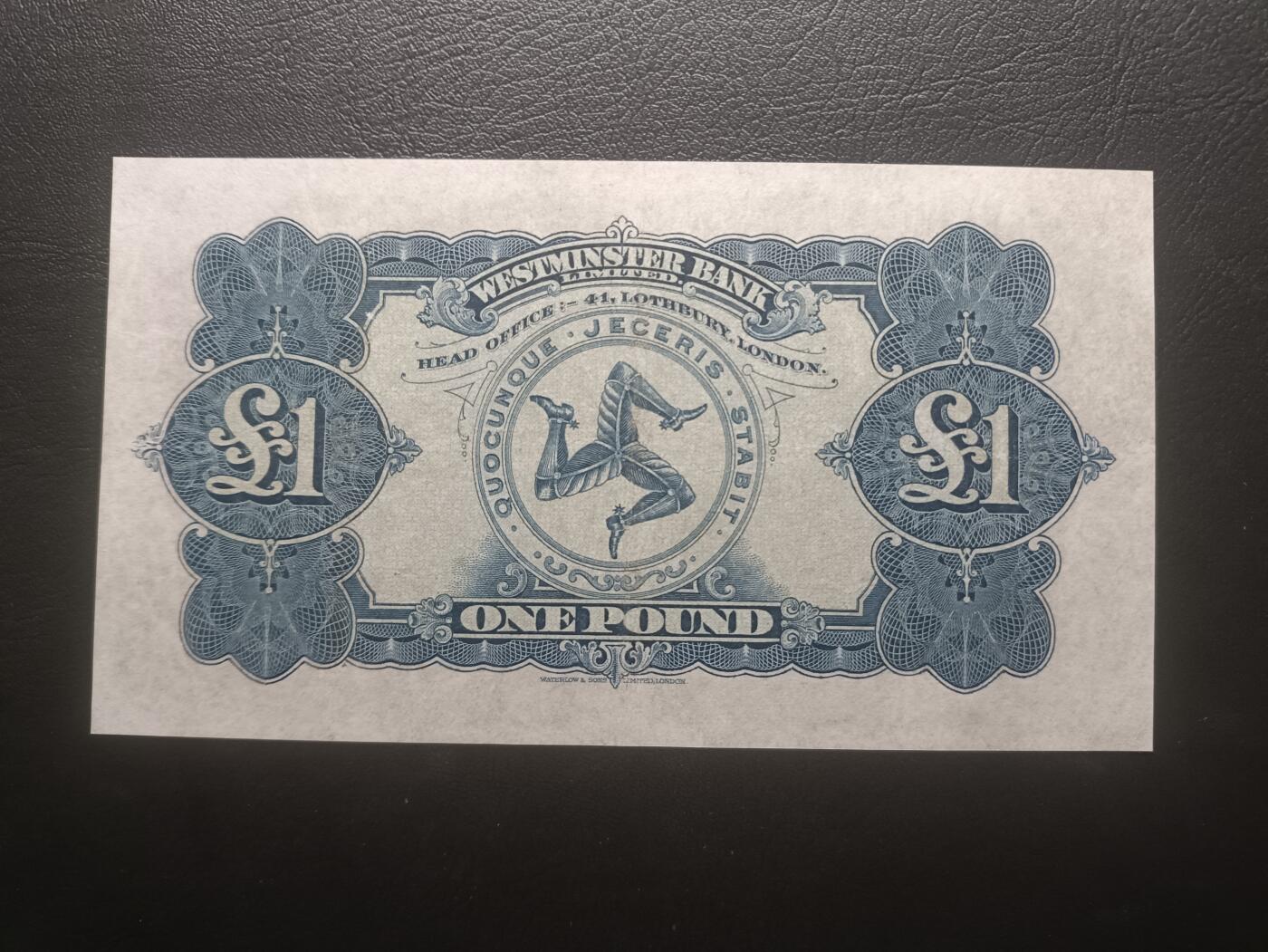 2025七月第二期（总第184期） 马恩岛威斯敏斯特银行1944年1镑UNC-，稀有的皇家三属地里的早期品种，有早期英镑的神韵，此品种实发行票PMG评级仅三张记录，最高分35分，故此品相极其难得