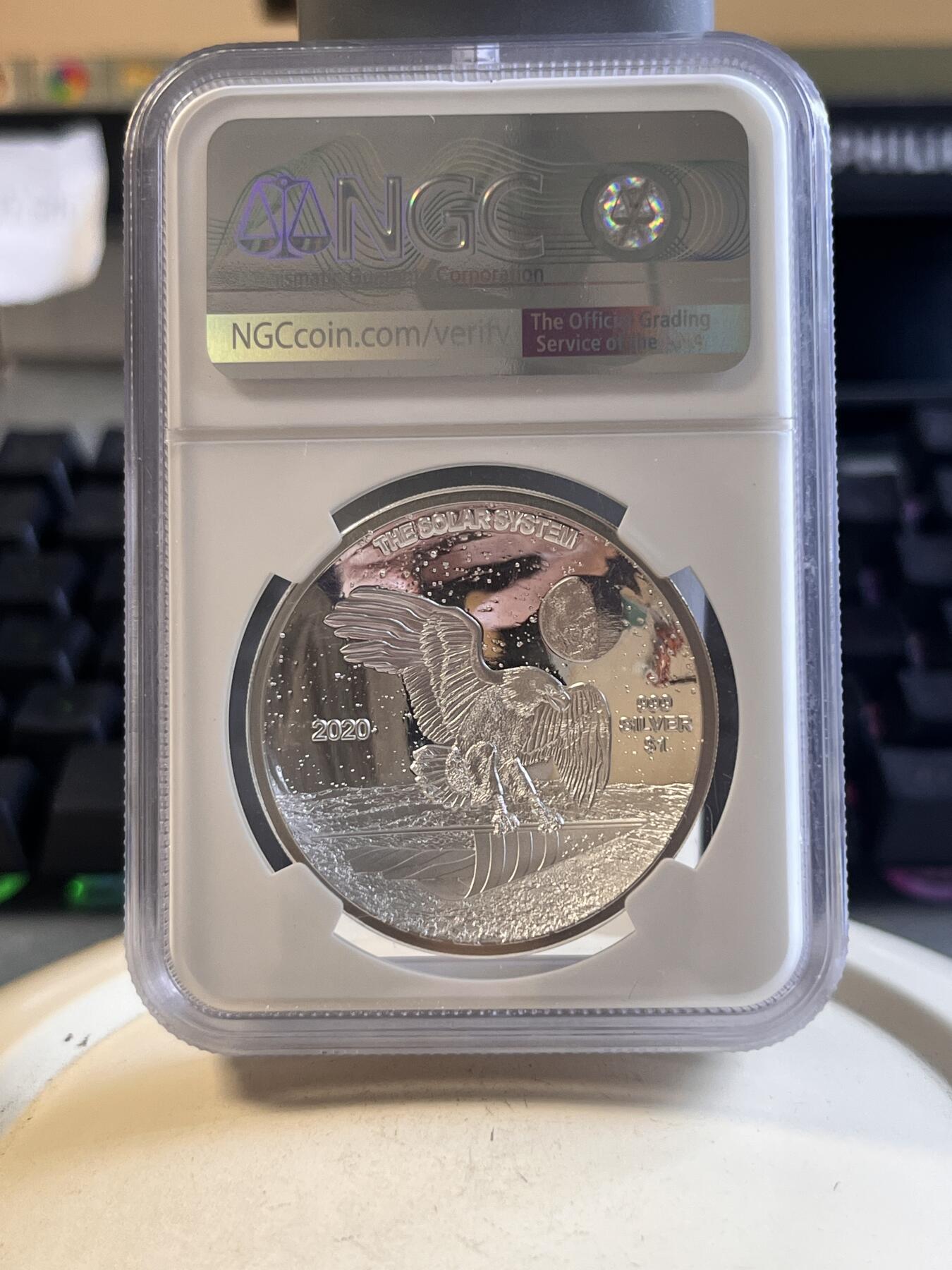 第166期拍卖【长期征集拍品】 美国2020年太阳系列太阳曲面彩色纪念银币NGC-PF70无盒证书，999银，发行1500枚