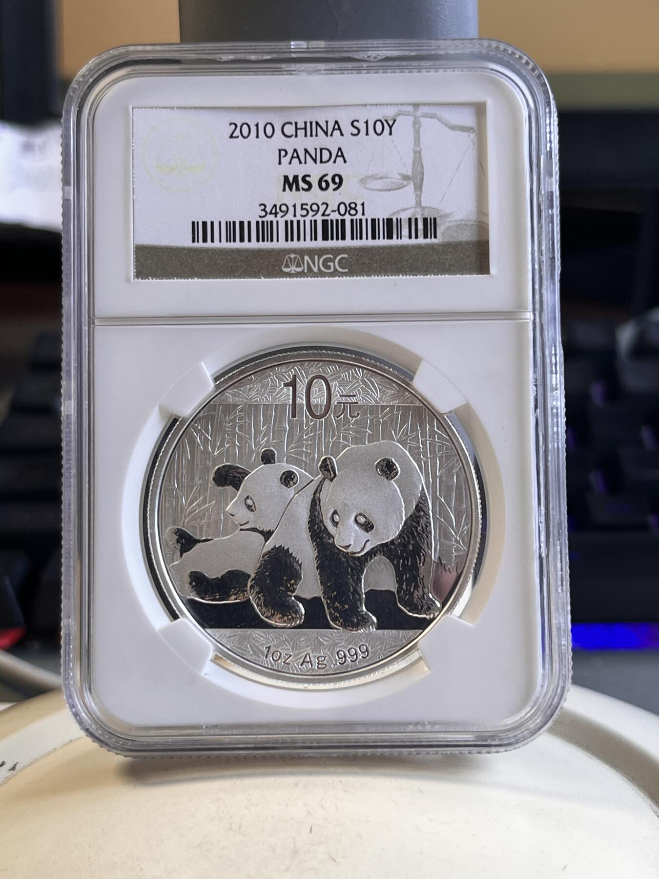 第166期拍卖【长期征集拍品】 中国2010年熊猫1盎司纪念银币NGC-MS69，999银