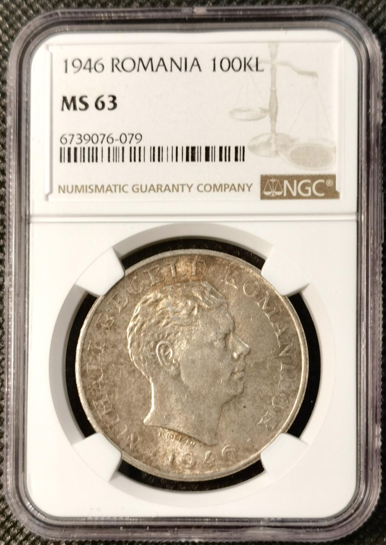  甄臻铺-世界币章拍卖（第25期），送拍享返佣金等优惠多多 NGC-MS63 罗马尼亚王国1946年米哈伊一世100000列伊银币。罗马尼亚王国银币最大面额，关门币。正面是末代国王米哈伊一世，背面是国徽及裹头巾罗马尼亚妇女双手祈祷，祈望和平鸽降临。灰常富有象征意义和时代特色。