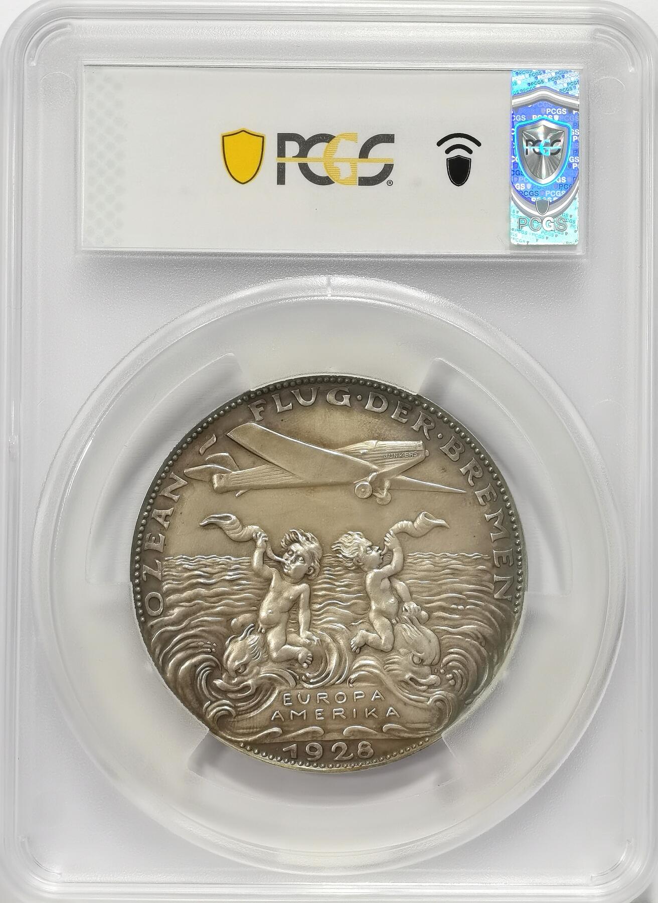 博洋堂世界钱币拍卖第131期（全场包邮） PCGS MS63 卡尔-哥茨作品 德国1928年不莱梅号首次跨大西洋飞行 纪念银章，稀有的60mm大型纪念章，背面两只海兽托举的丘比特，手持海螺号角，象征航海与航空的联结，兼具神话浪漫色彩。2019年德国拍卖会以1200欧成交类似银章，大型银章发行量极少，极具收藏价值。