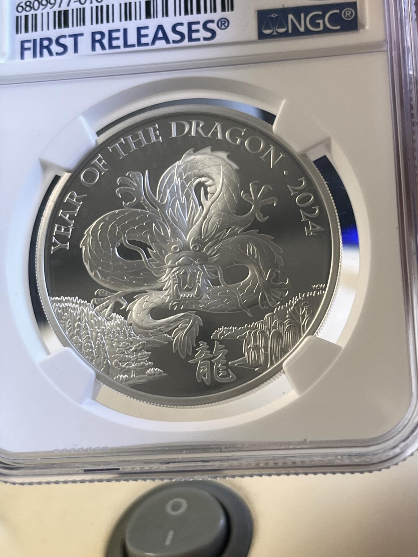 第166期拍卖【长期征集拍品】 英国2024年发行十二生肖龙年精制纪念银币NGC-PF70首无原盒证书，999银，1盎司，发行3898枚