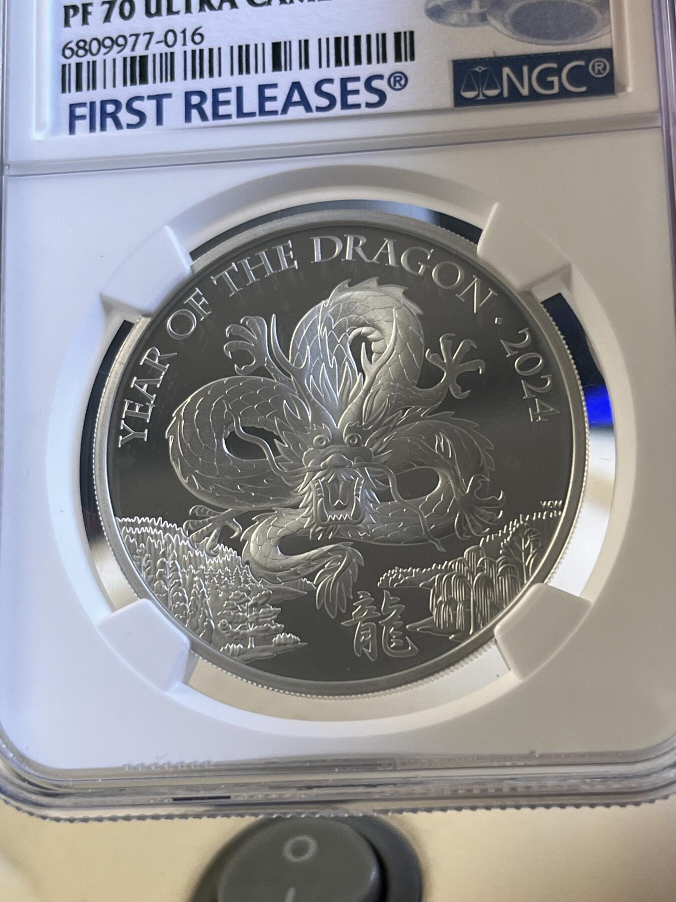 第166期拍卖【长期征集拍品】 英国2024年发行十二生肖龙年精制纪念银币NGC-PF70首无原盒证书，999银，1盎司，发行3898枚