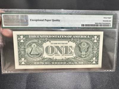 《外钞收藏家》第五百四十七期（本期稀少裸币、刀币、精品评级）（本平台长期征集拍品、欢迎藏友们联系合作） 2009年美国1美元 PMG68 高分 无47 520头豹子号333