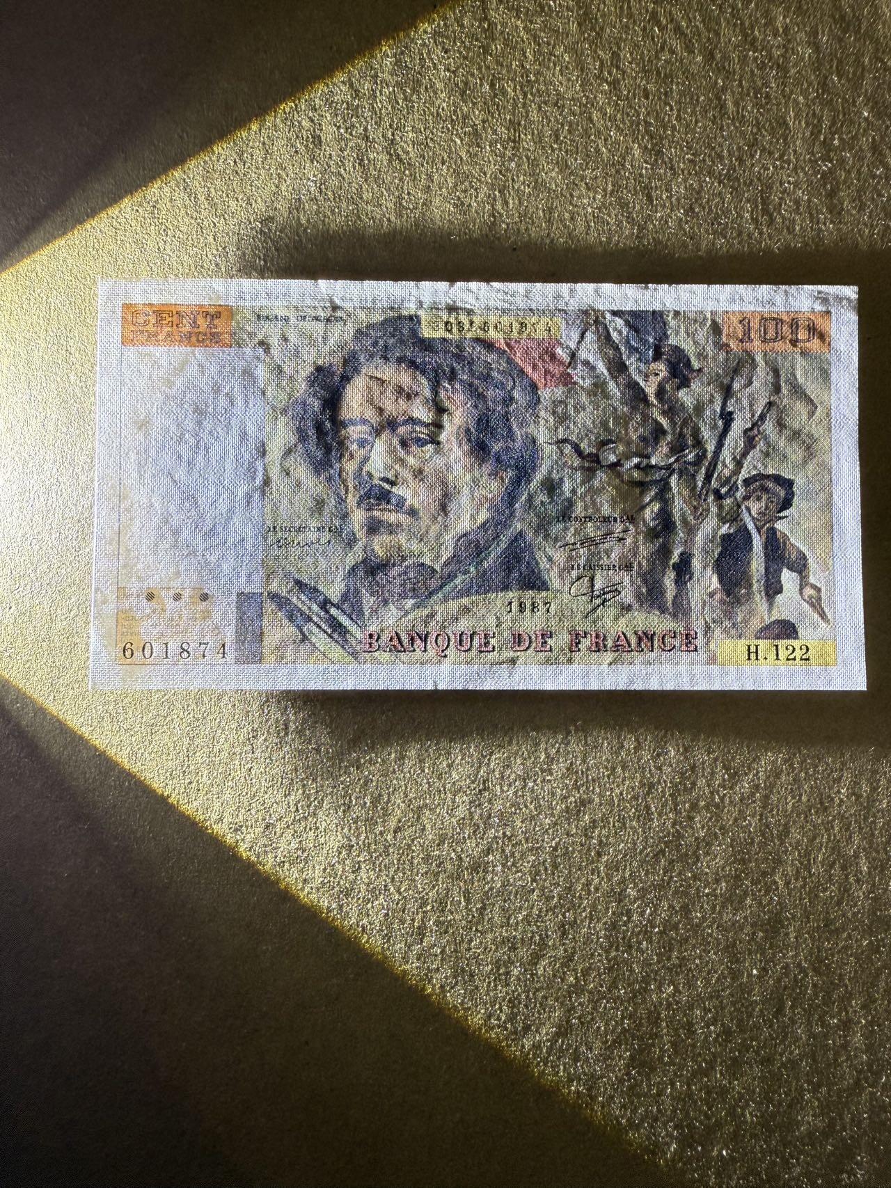 【炜奕收藏】，第三十九期 1987年法国100法郎，UNC-品相，轻微点钞痕，角有压痕