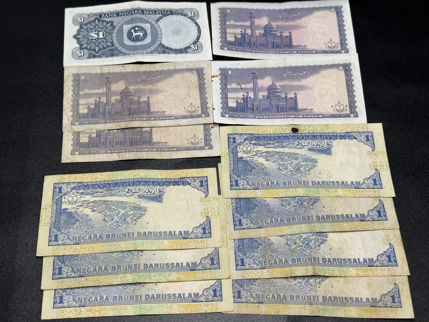 《外钞收藏家》第五百四十八期（本期以精品评级为主）（本平台长期征集拍品、欢迎藏友们联系合作） 马来西亚1令吉特 几个版本12张一起 流通品 