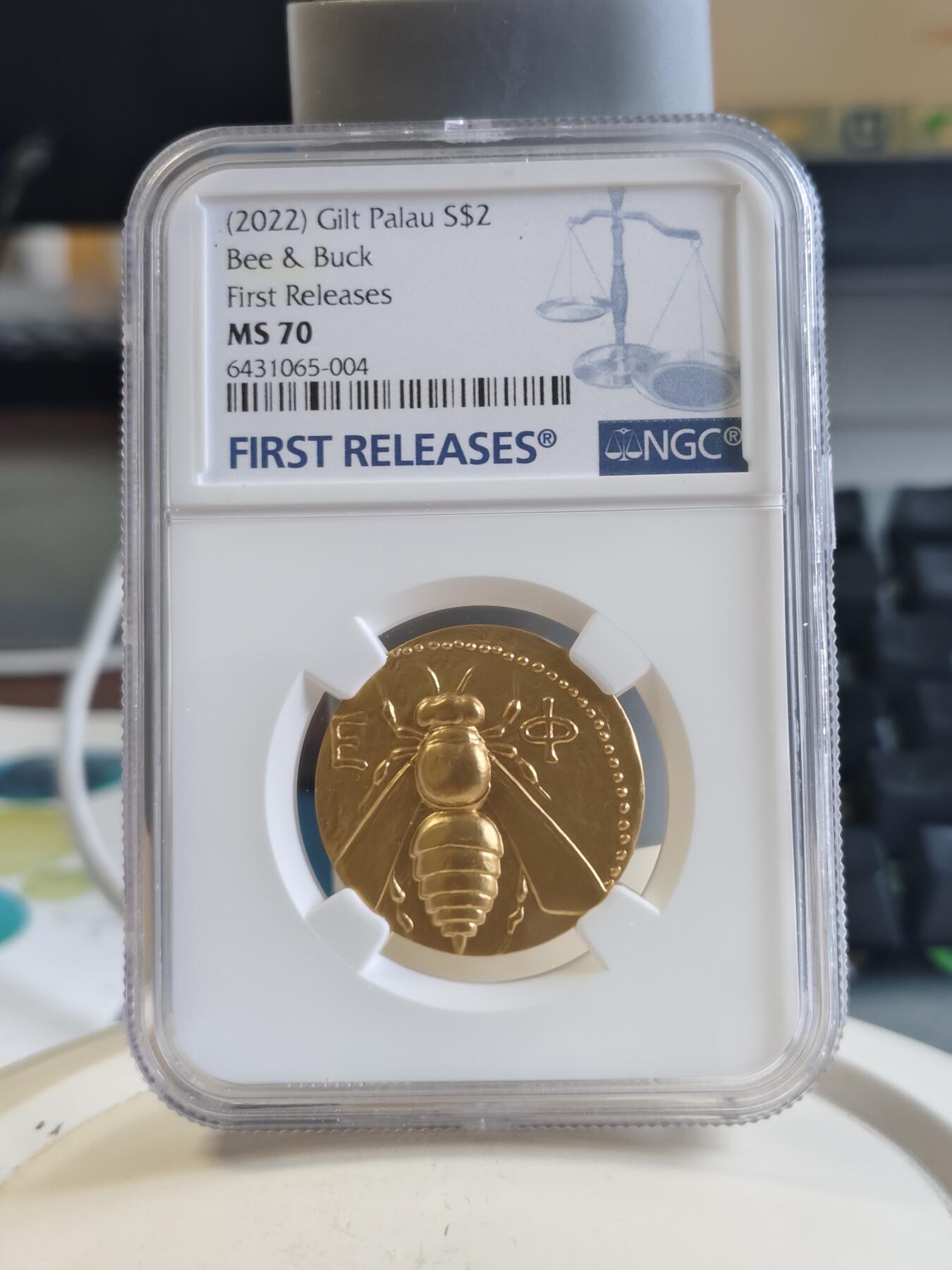 第166期拍卖【长期征集拍品】 帕劳2022年蜜蜂与雄鹿镀金纪念银币NGC-MS70首原盒证书，15克，999银，发行500枚