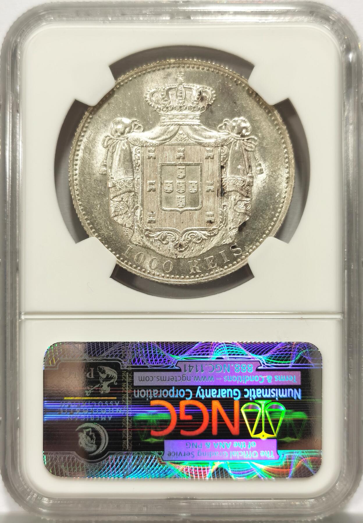博洋堂世界钱币拍卖第131期（全场包邮） NGC MS61 1899年葡萄牙1000R银币。非常少见的十九世纪末葡萄牙高分主币，黄油包浆非常养眼，NGC老盒重评有机会加分。类似品相者麦稀奇基本在1200元左右