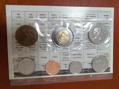 长老汇蛇年精选第二十四场拍卖 - 2003加拿大7枚套币原厂塑封装带外纸，总面值3.91加元，其中2加元双色币克书标价35美金