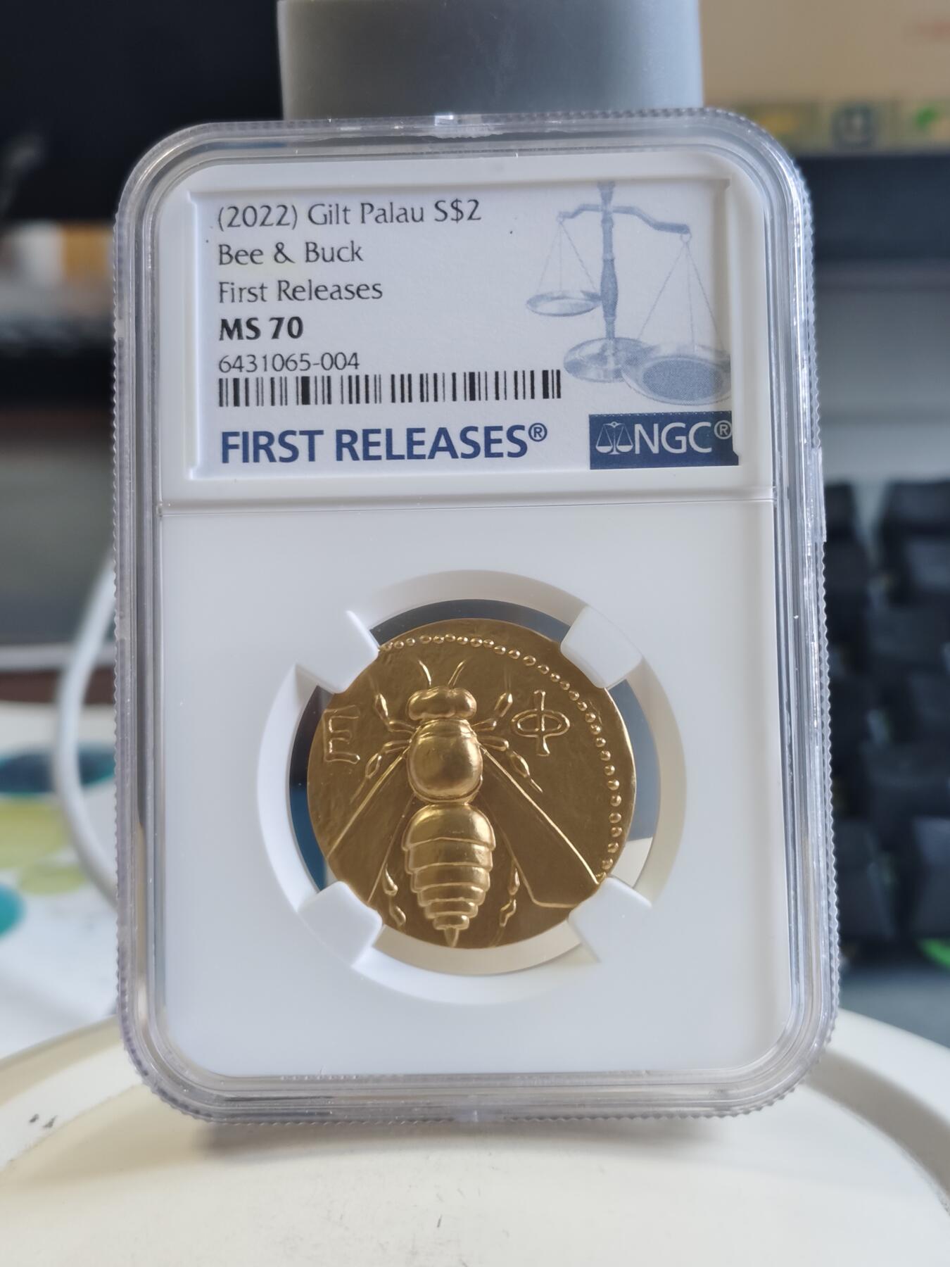 第166期拍卖【长期征集拍品】 帕劳2022年蜜蜂与雄鹿镀金纪念银币NGC-MS70首原盒证书，15克，999银，发行500枚