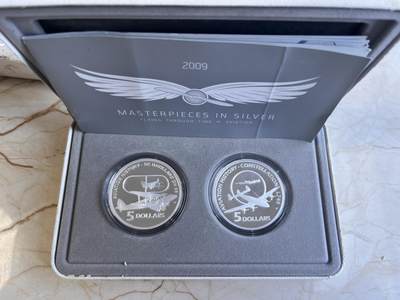 第167期拍卖【长期征集拍品】 - 澳大利亚2009年航空史36.31克精制纪念银币2枚套装，999银，36.31克*2，发行7000套，皮盒有脱皮