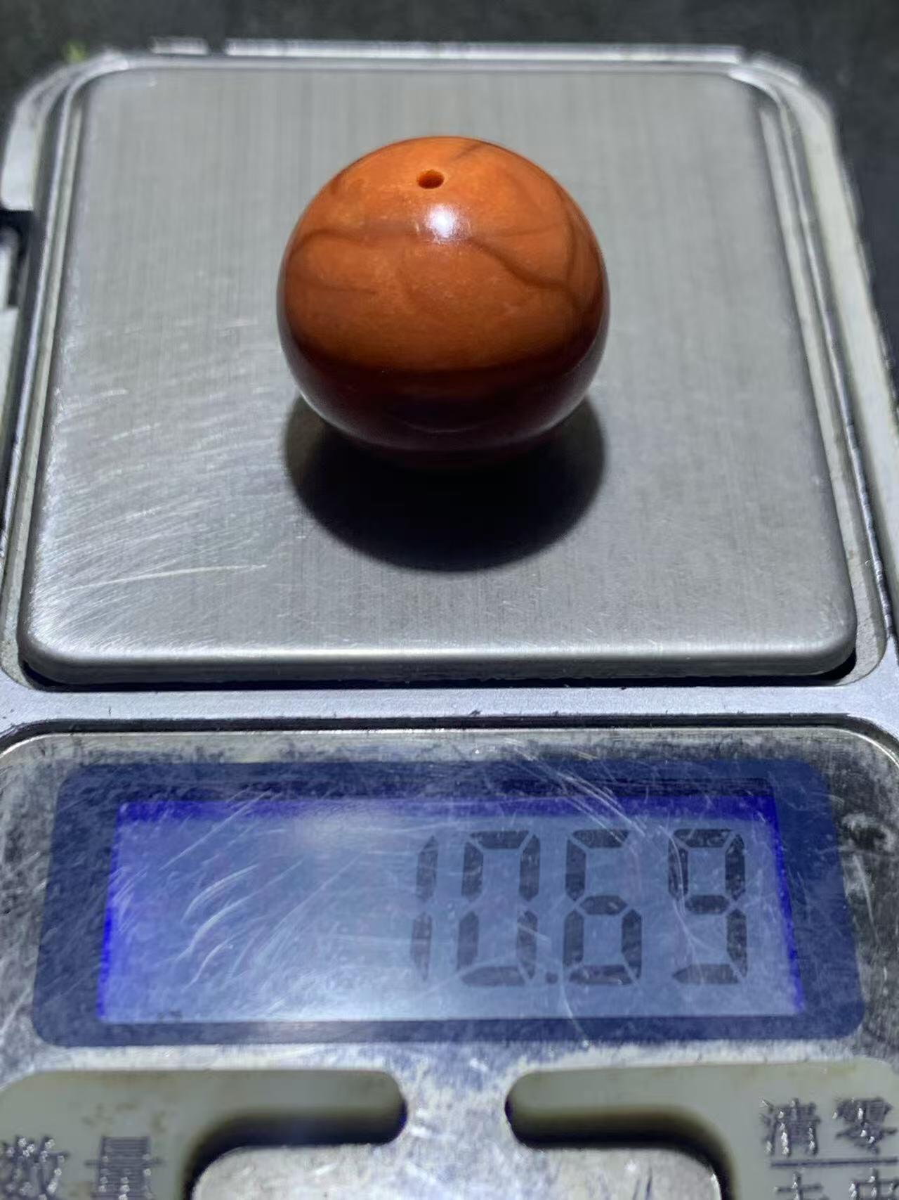 南红玛瑙柿子红2.0通货圆珠一颗，