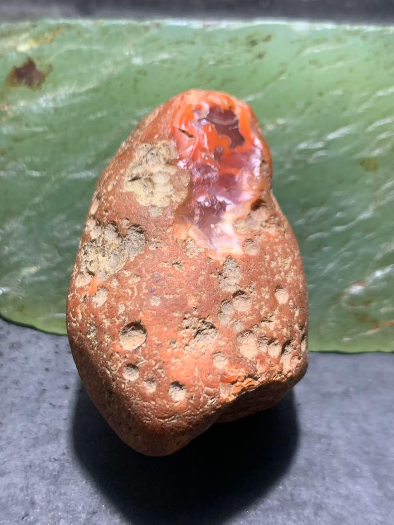 精美川料红皮开窗柿子红紫罗兰南红玛瑙原石一颗