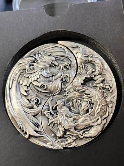 第167期拍卖【长期征集拍品】 - 乍得2021年阴阳太极龙凤呈祥2盎司高浮雕银币2枚套，金属:999银+铜，重量:2盎司银*2+11.5盎司铜*2，直径:60*80毫米，发行：500枚