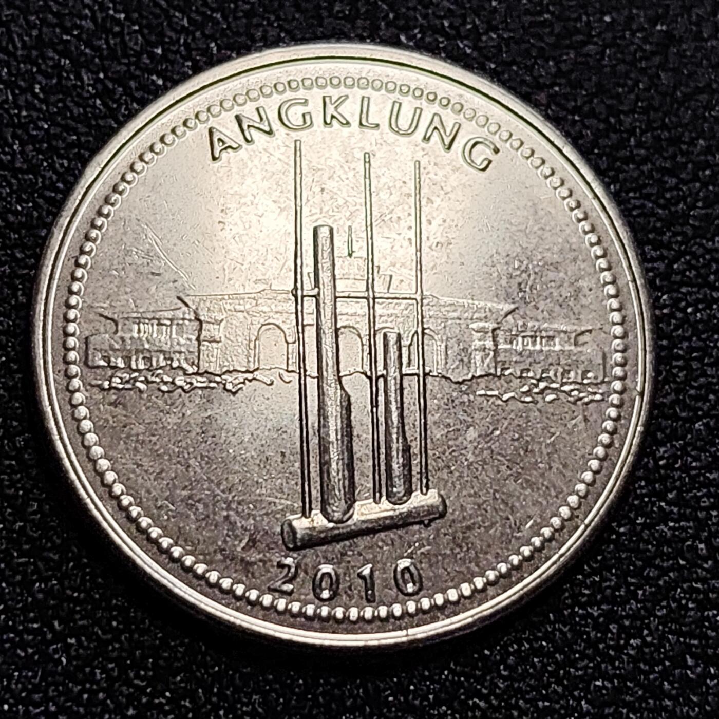 泉币菌-第58场-各国老币铜币场 印度尼西亚 1000卢比 打球