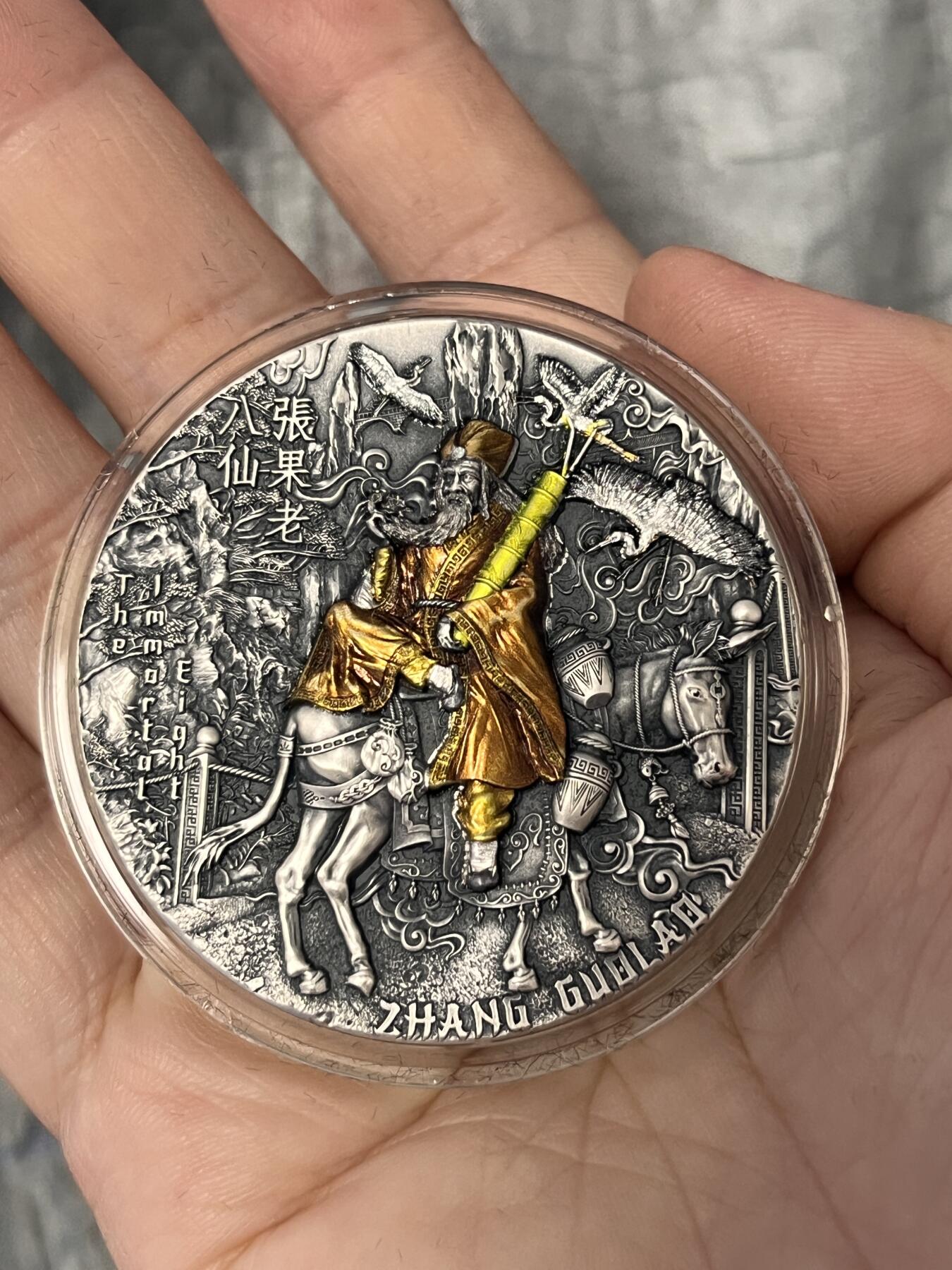 第168期拍卖【长期征集拍品】 纽埃2022年八仙过海系列首枚张果老2盎司高浮雕彩银币系列首枚，999银，发行量500枚