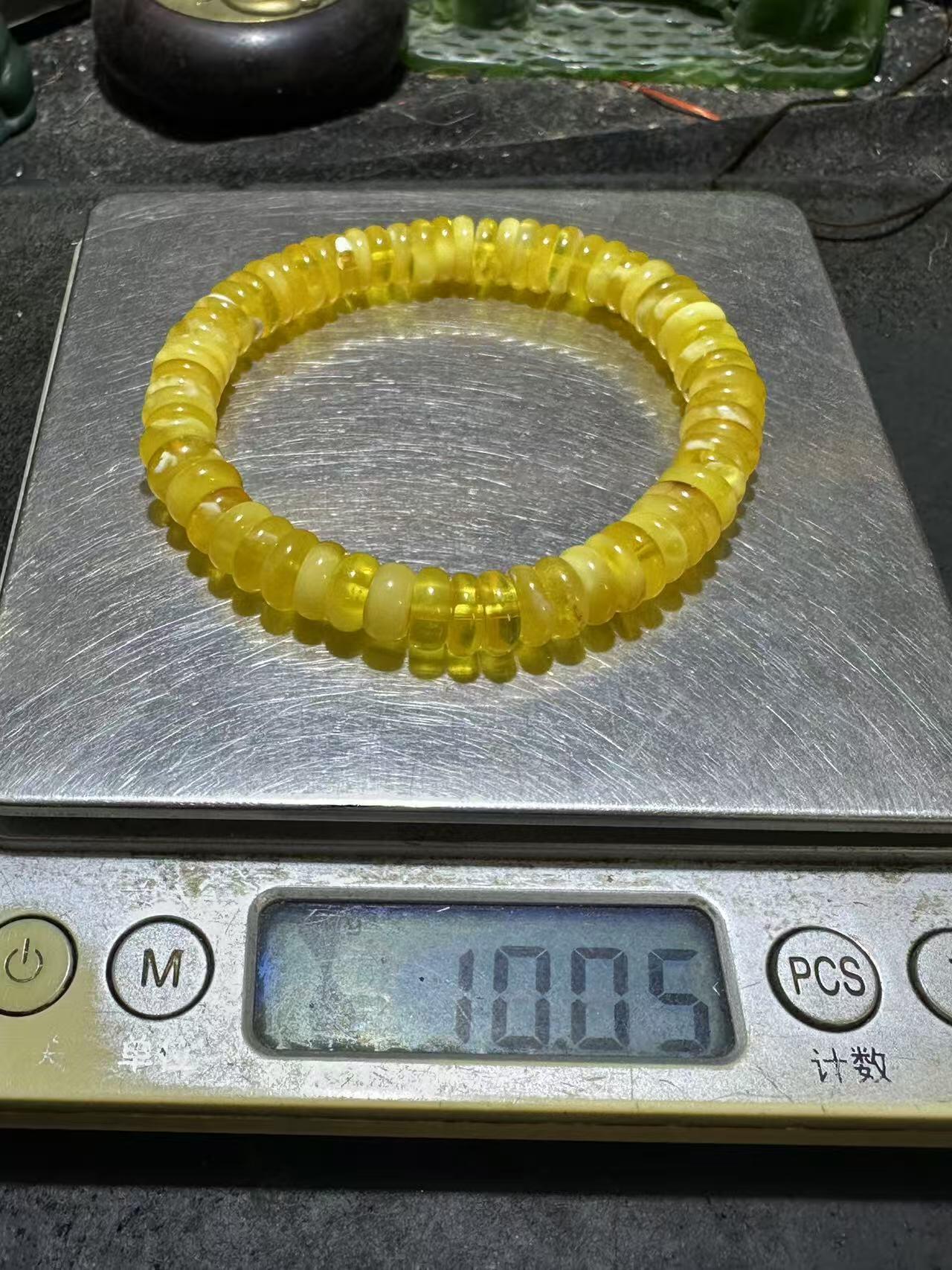 精美天然乌料蜜蜡隔片手串1条！