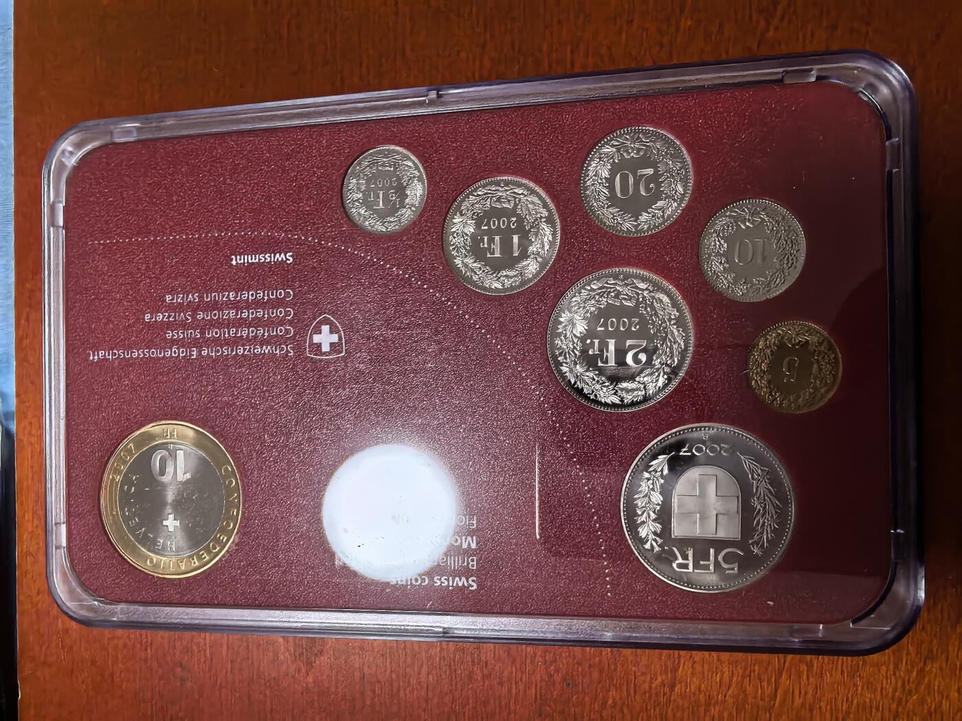 长老汇蛇年精选第二十七场拍卖 2007瑞士精制币8枚套，盒证全，含10法郎精制双色币1枚