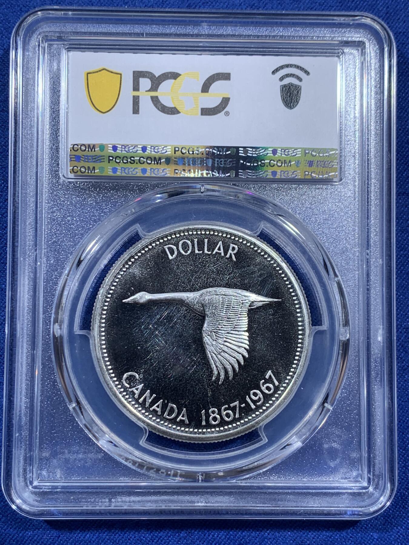 《竞宝斋》第404场 周日，周一，2场连拍 （全场包邮） PCGS PL65 加拿大1967年建国百年纪念一圆大银币 经典大雁图案 非常漂亮的白币 币面光洁 浮雕感很强