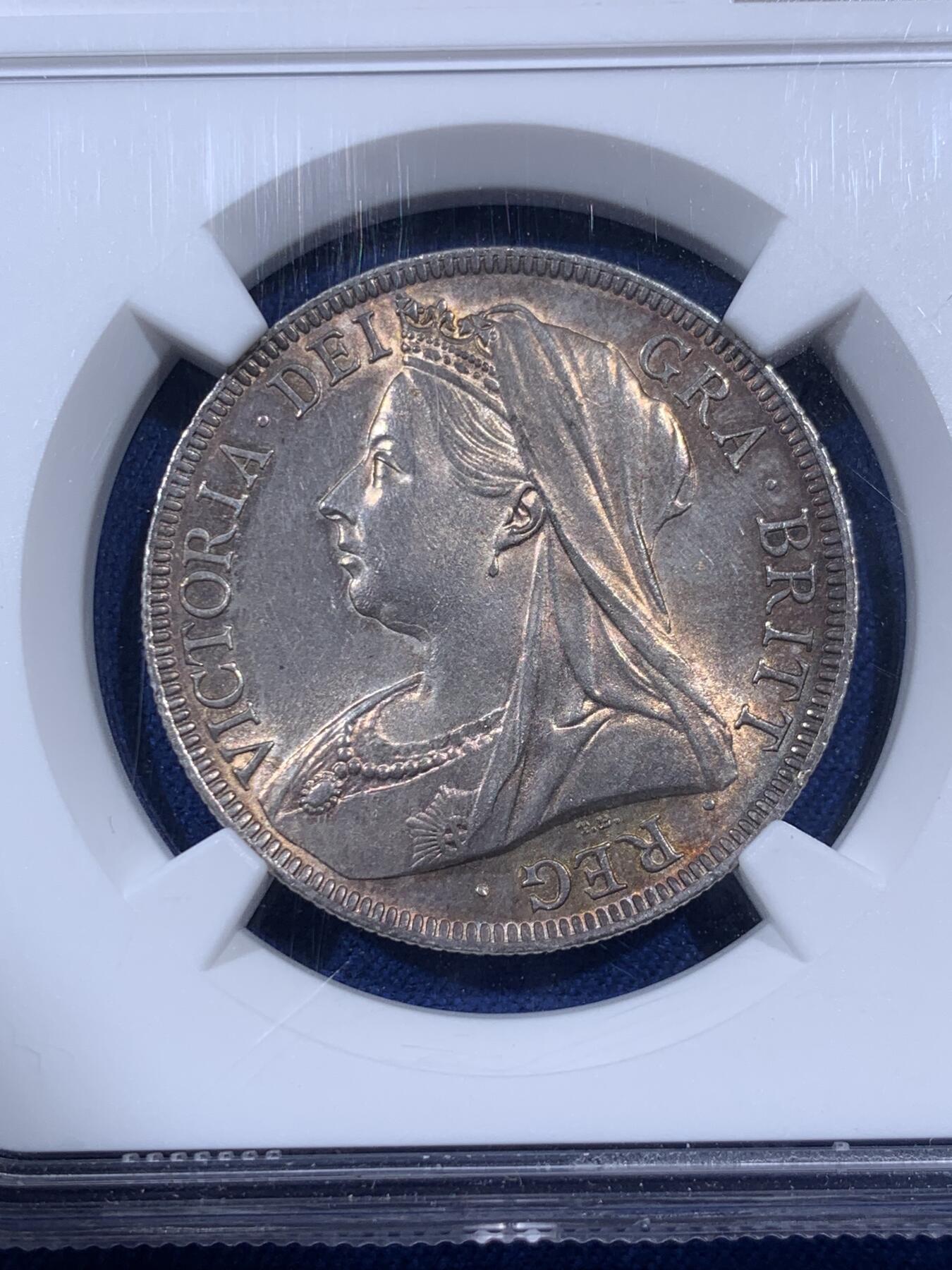 《竞宝斋》第404场 周日，周一，2场连拍 （全场包邮） NGC UNC 英国1897年维多利亚披纱半克朗银币 五彩包浆 细节极好