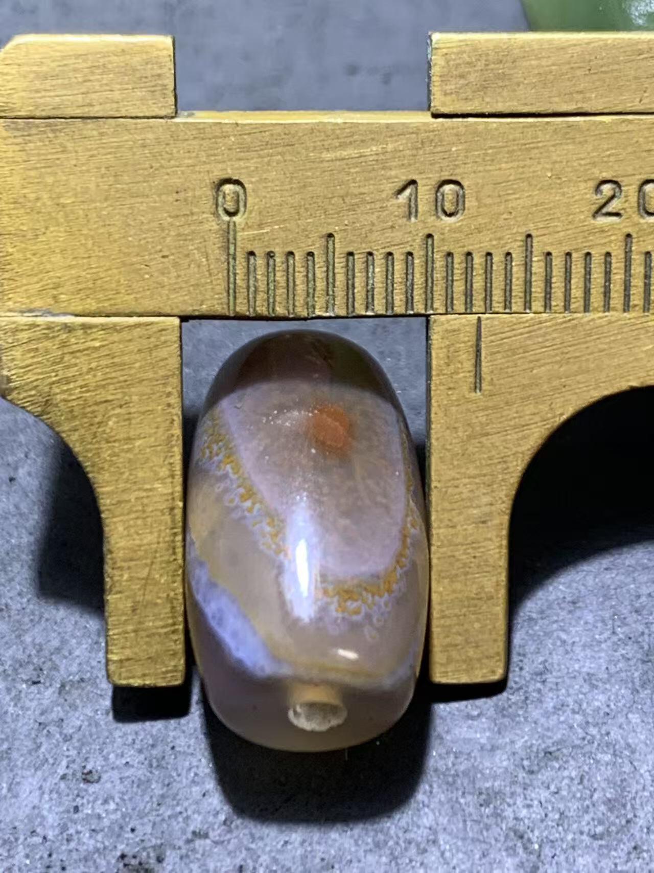 精美天然高玉化朱砂点天眼纹巴西玛瑙随形桶珠一颗