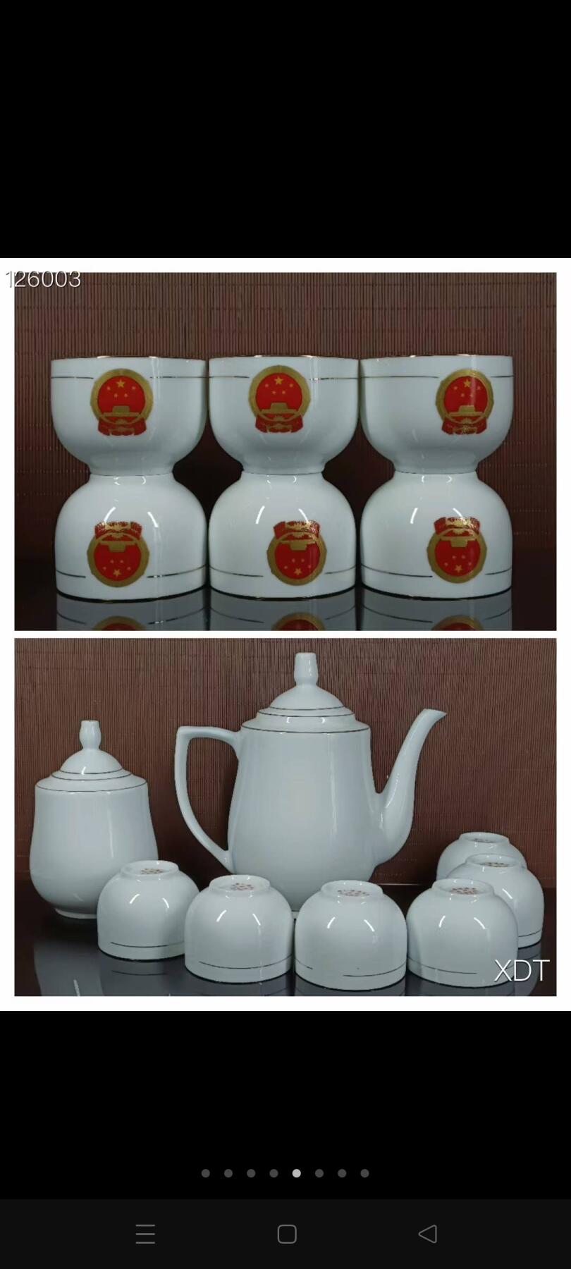 图案毛瓷茶具装在木盒里
