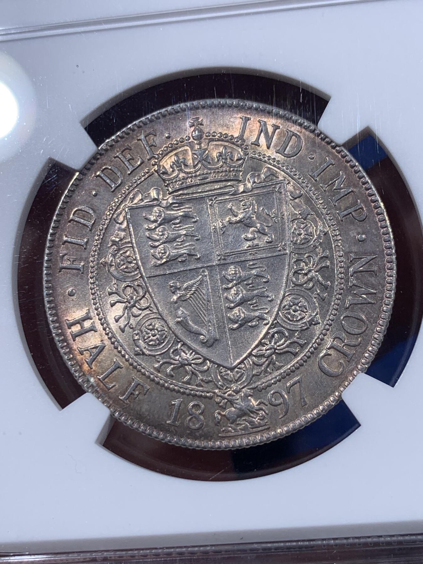 《竞宝斋》第404场 周日，周一，2场连拍 （全场包邮） NGC UNC 英国1897年维多利亚披纱半克朗银币 五彩包浆 细节极好