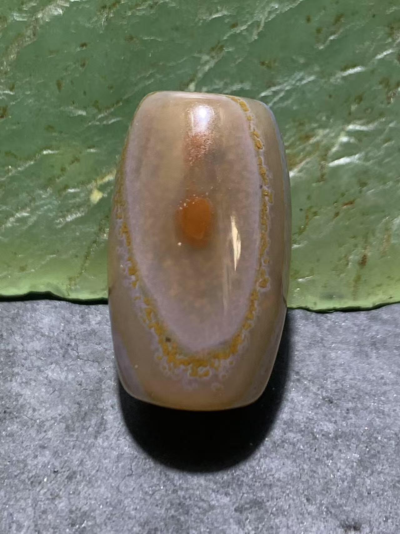 精美天然高玉化朱砂点天眼纹巴西玛瑙随形桶珠一颗