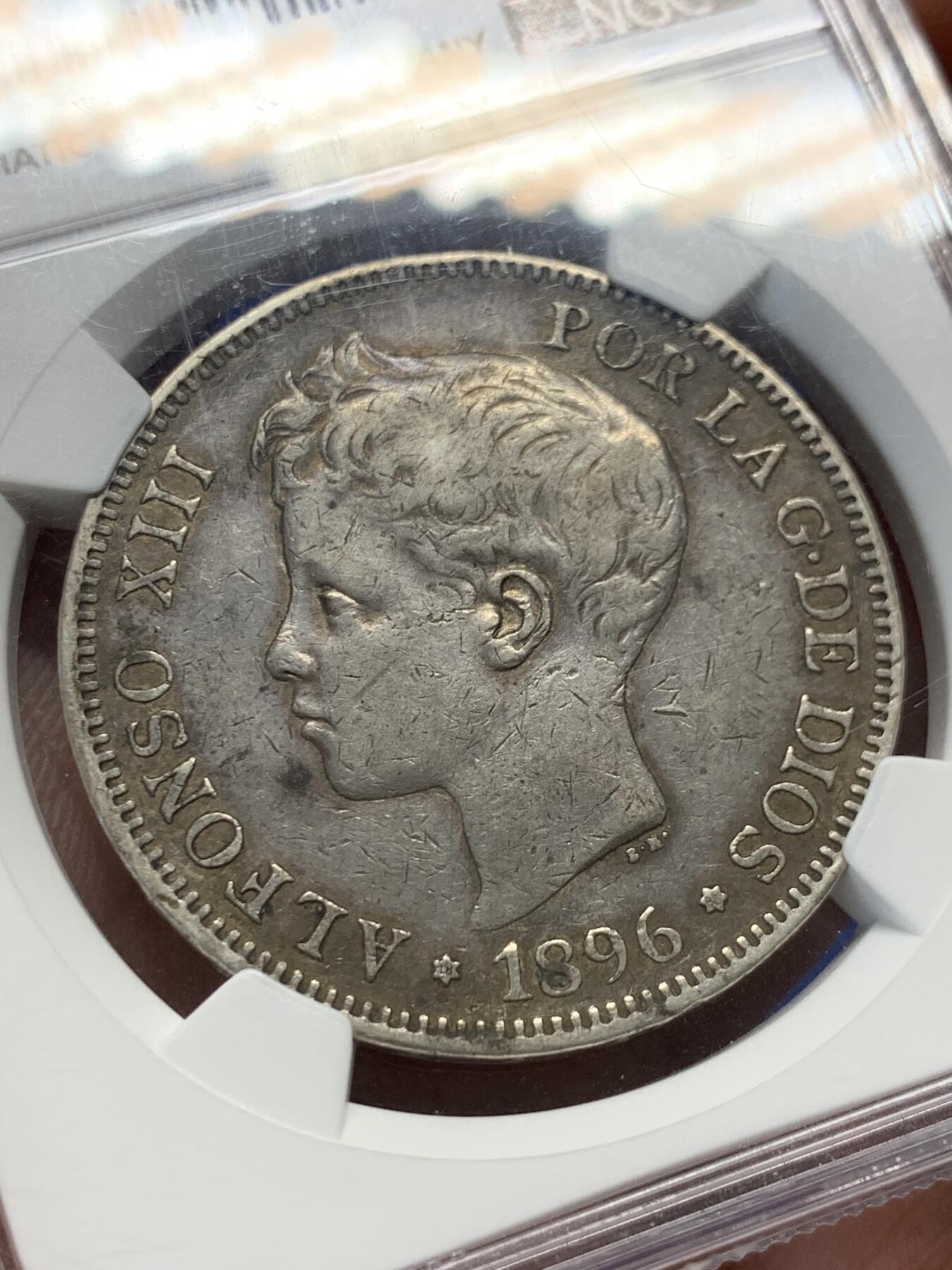 《竞宝斋》第404场 周日，周一，2场连拍 （全场包邮） NGC VF35 西班牙1896年正太头5比赛塔银币 克书XF价格和1898的MS一样 评级量是后者十分之一