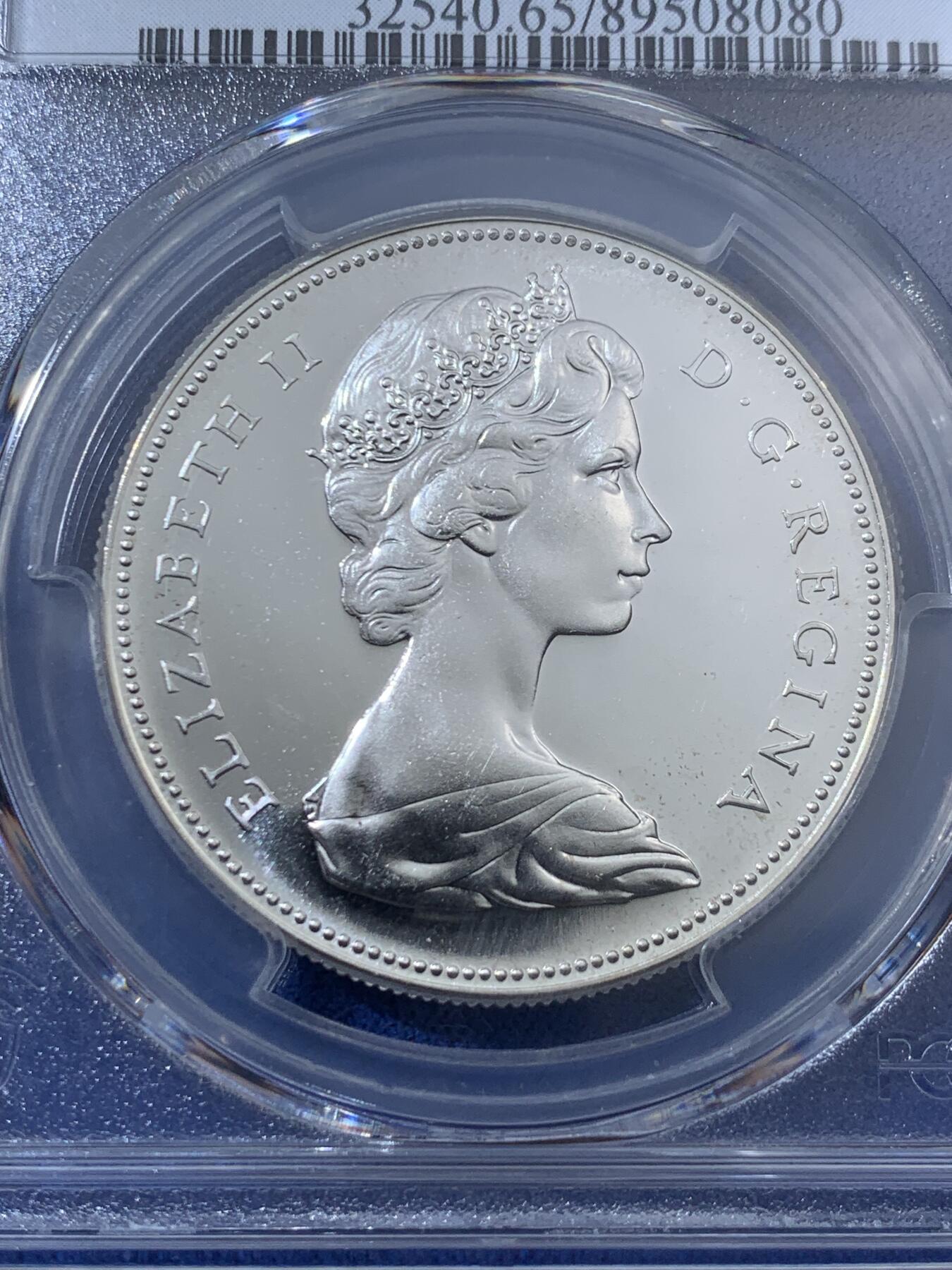 《竞宝斋》第404场 周日，周一，2场连拍 （全场包邮） PCGS PL65 加拿大1967年建国百年纪念一圆大银币 经典大雁图案 非常漂亮的白币 币面光洁 浮雕感很强