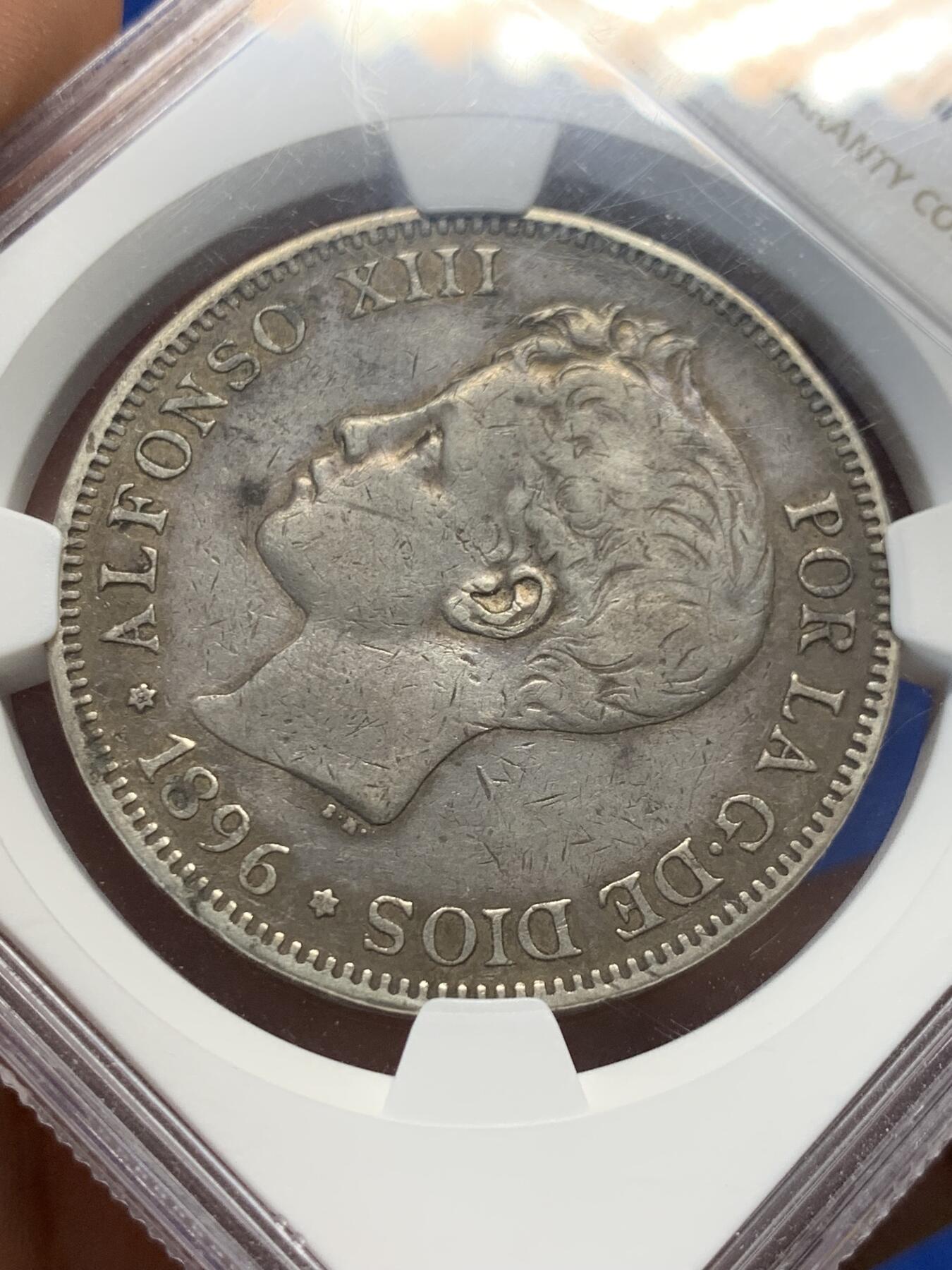 《竞宝斋》第404场 周日，周一，2场连拍 （全场包邮） NGC VF35 西班牙1896年正太头5比赛塔银币 克书XF价格和1898的MS一样 评级量是后者十分之一