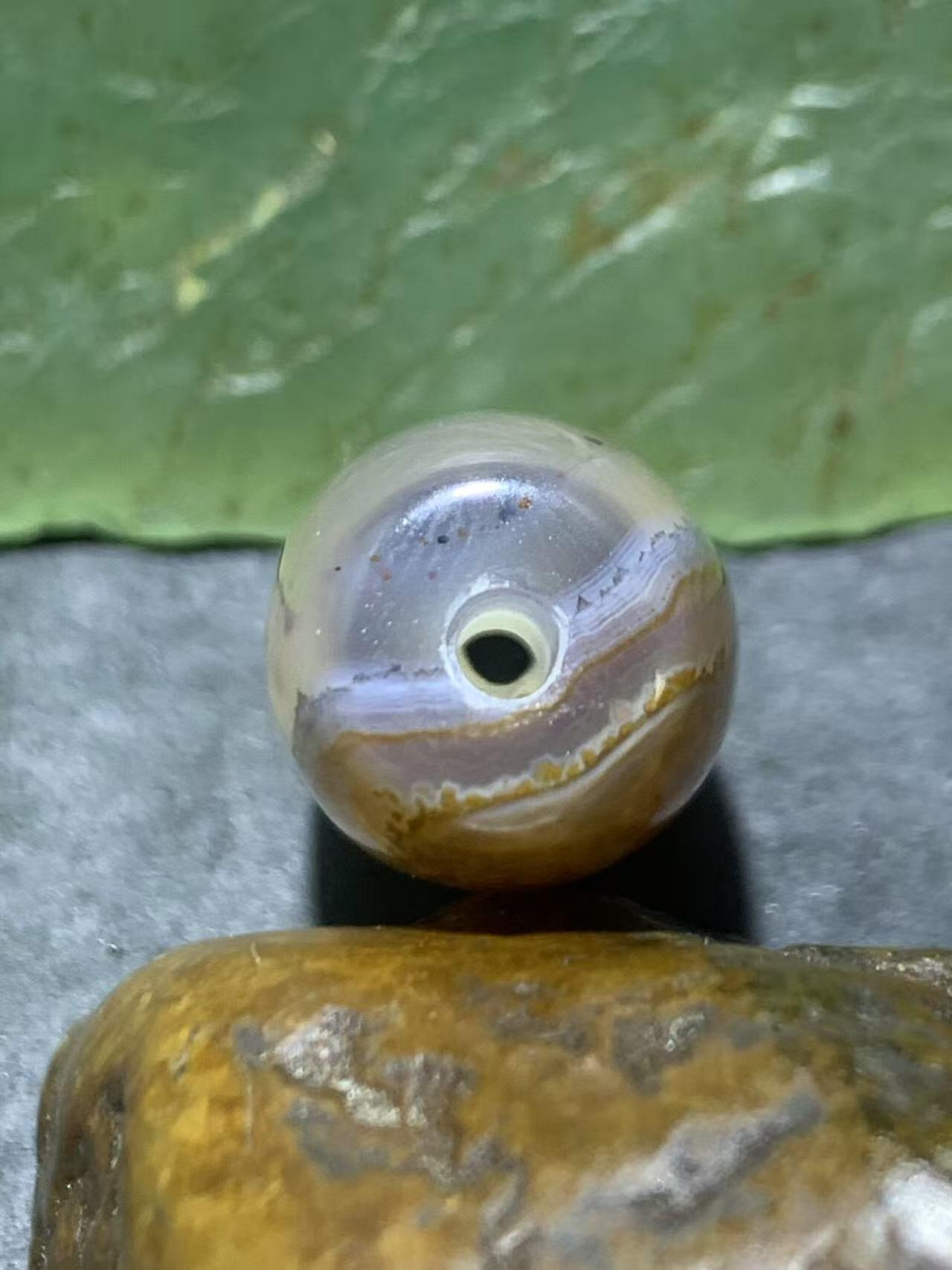 精美天然高玉化朱砂点天眼纹巴西玛瑙随形桶珠一颗