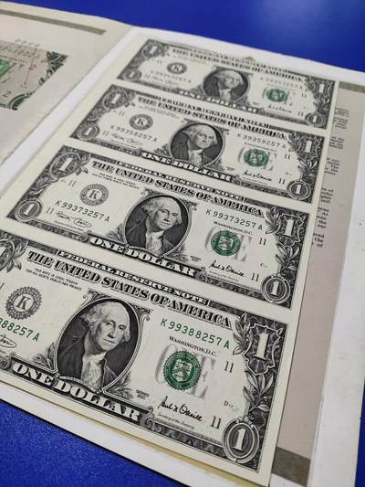 搬档清货，卡类收藏之B 交行东莞分行装祯版美国01版1元四连体钞