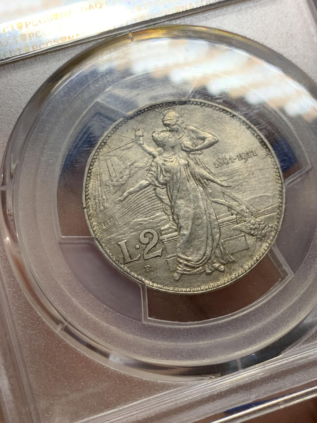《竞宝斋》第404场 周日，周一，2场连拍 （全场包邮） PCGS AU58 意大利1911年2里拉银币 小托奶好品种 图案漂亮转光也好 略低评
