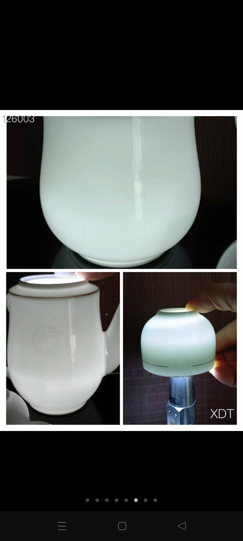图案毛瓷茶具装在木盒里