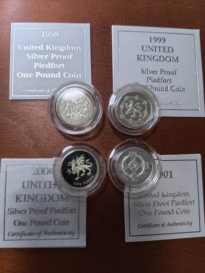 长老汇蛇年精选第二十八场拍卖 1998-2001英国1英镑精制加厚银币4枚，盒证全