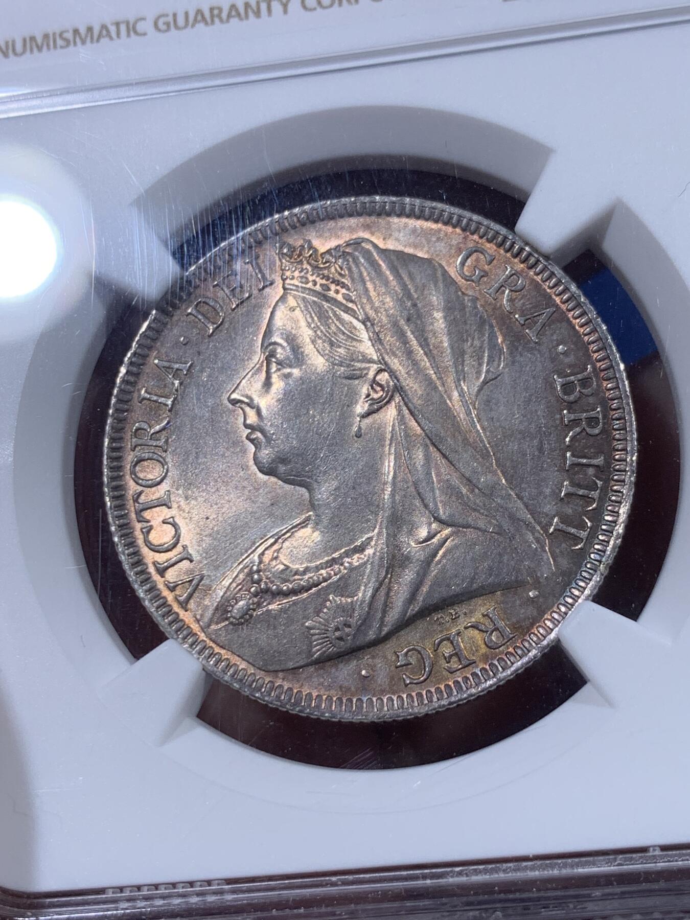 《竞宝斋》第404场 周日，周一，2场连拍 （全场包邮） NGC UNC 英国1897年维多利亚披纱半克朗银币 五彩包浆 细节极好