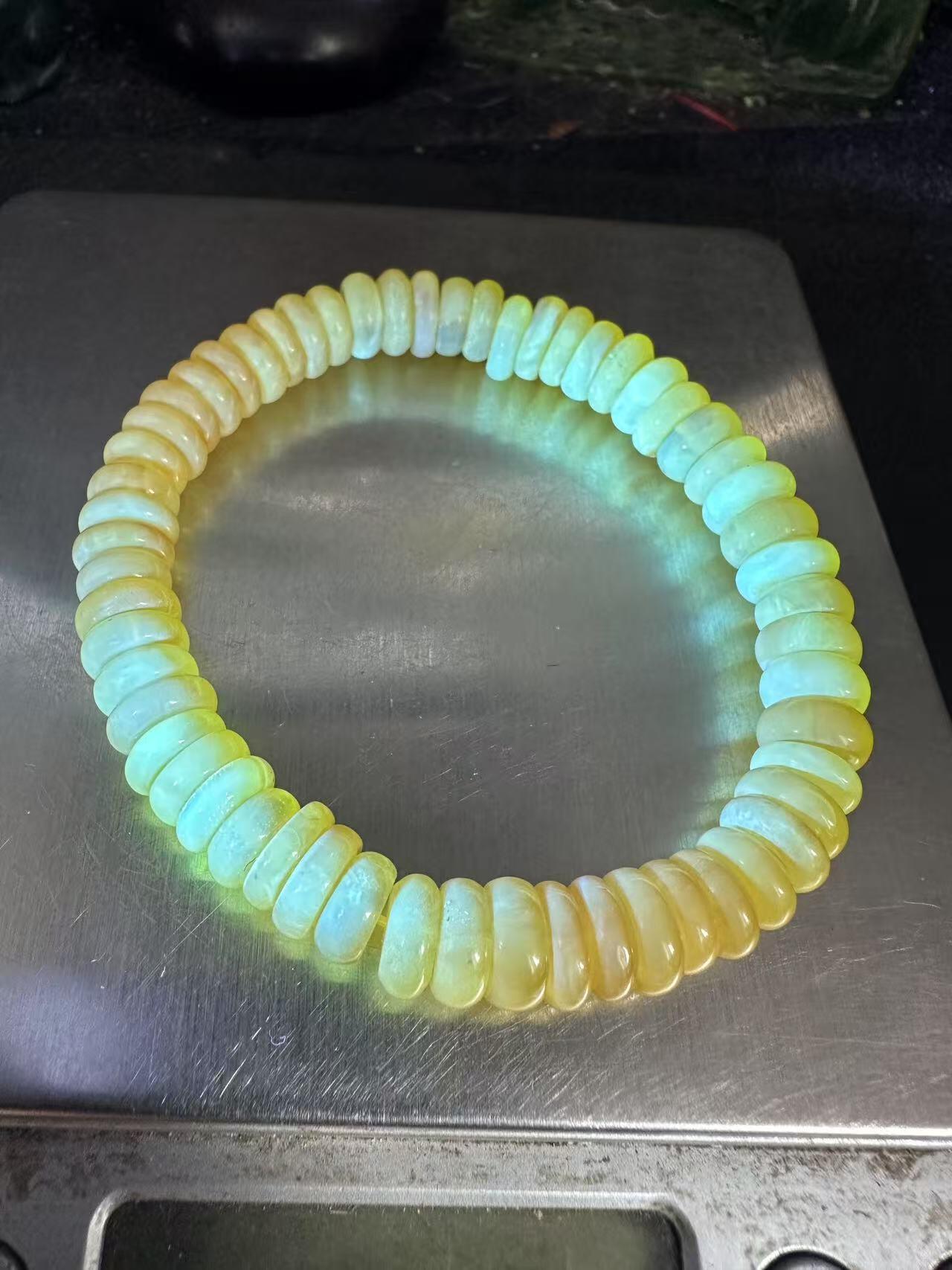 精美天然乌料蜜蜡隔片手串1条！，