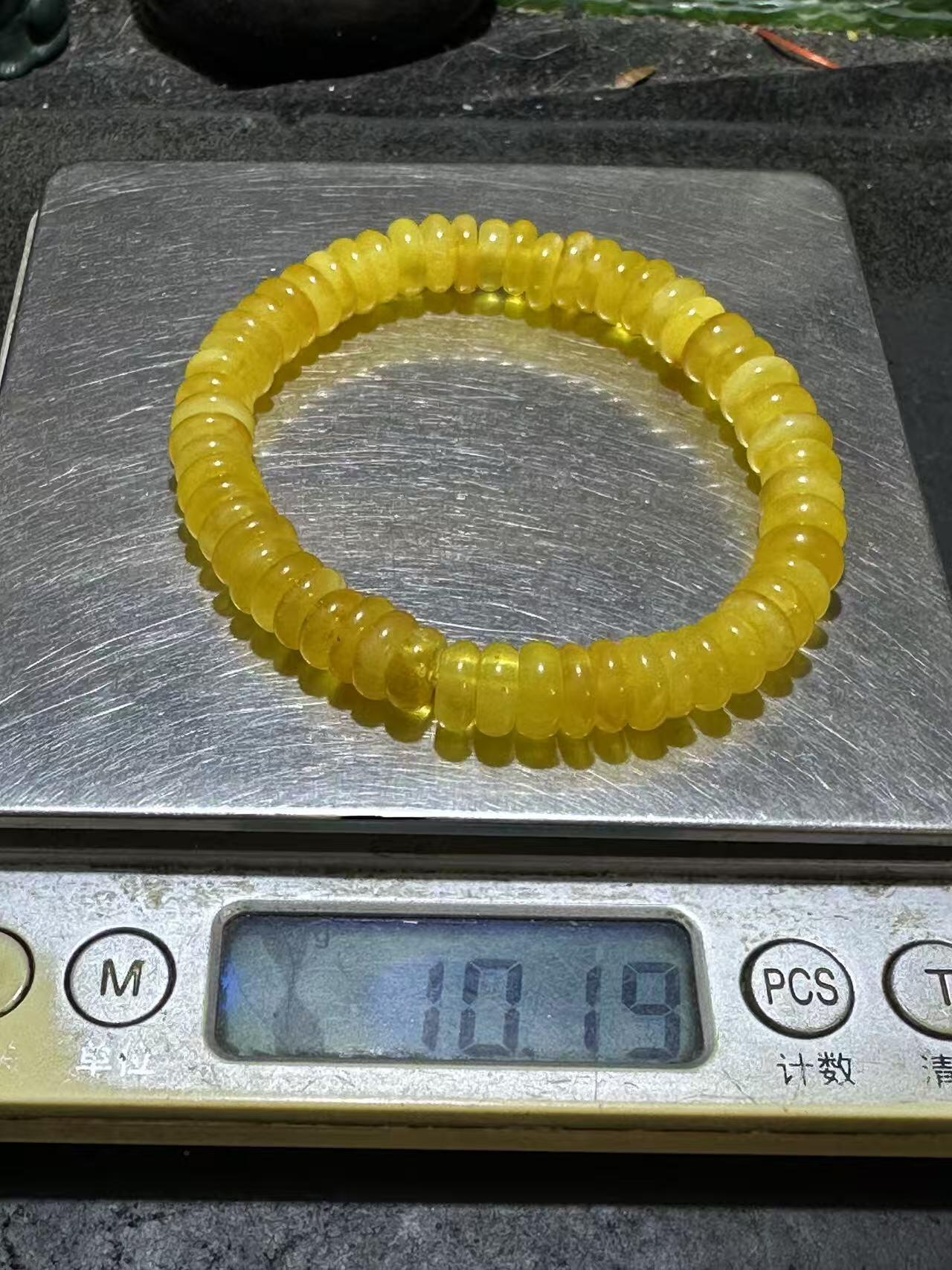 精美天然乌料蜜蜡隔片手串1条！，
