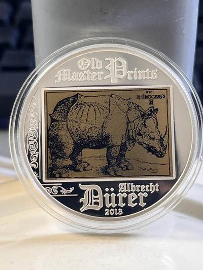 第167期拍卖【长期征集拍品】 - 库克2013年《丢勒的犀牛》木板画复刻精制镶嵌铜雕版纪念银币，20克，925银，发行量2500枚