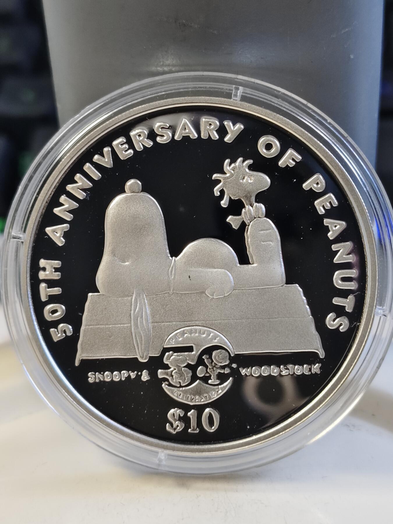 第168期拍卖【长期征集拍品】 纽埃2000年卡通人物史努比50周年精制纪念大银币，925银，发行10000枚