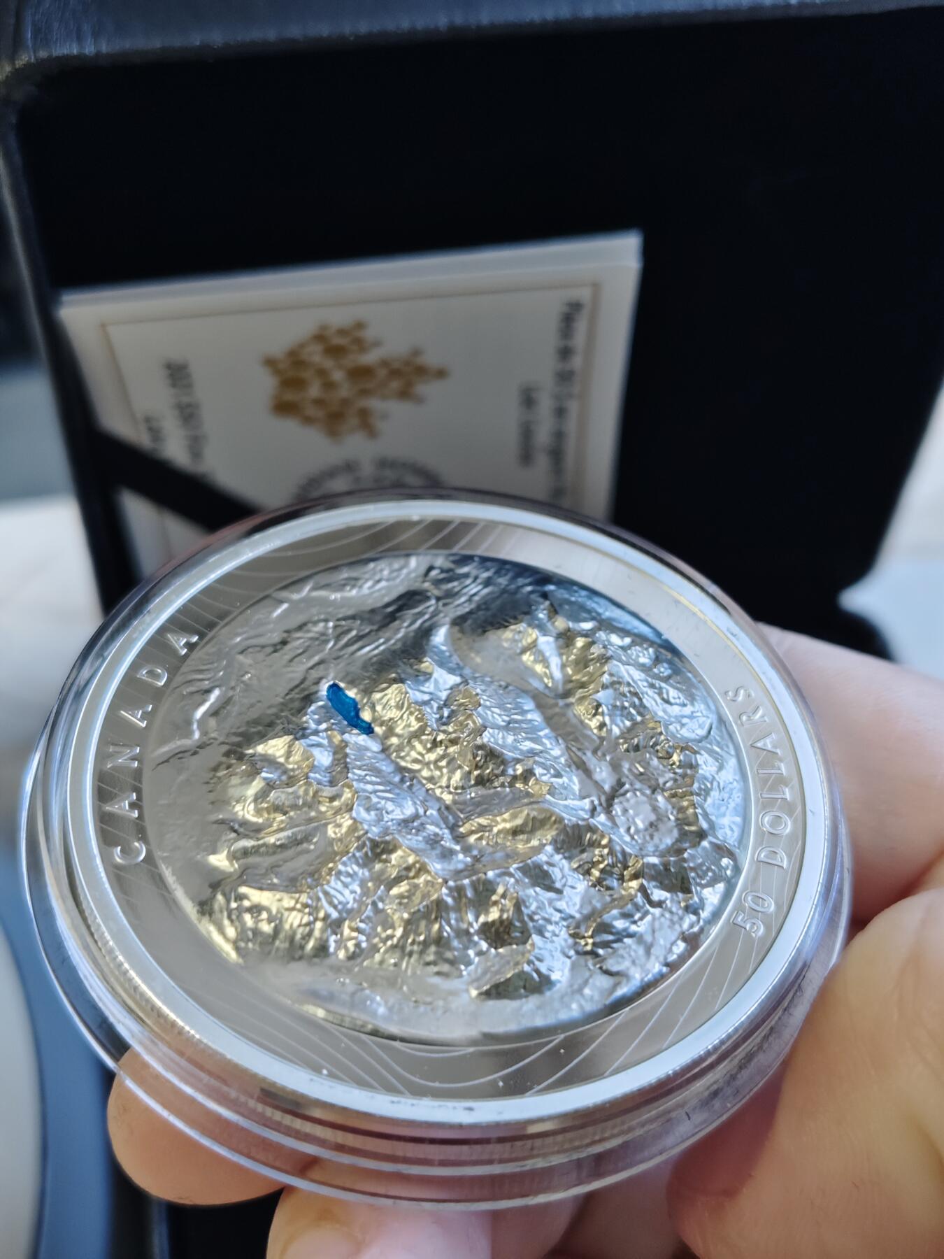 第168期拍卖【长期征集拍品】 加拿大2021年落基山脉明珠路易斯湖潮高浮雕银币，9999银，发行3000枚，边齿有氧化
