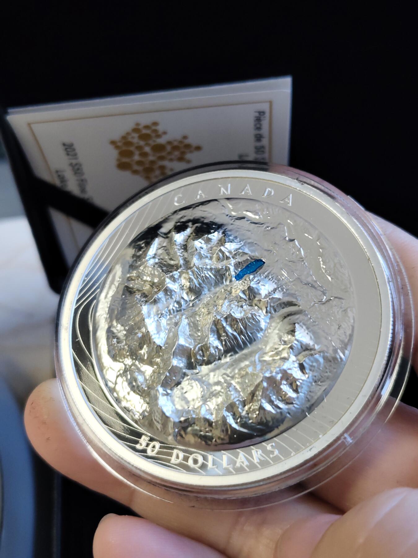 第168期拍卖【长期征集拍品】 加拿大2021年落基山脉明珠路易斯湖潮高浮雕银币，9999银，发行3000枚，边齿有氧化