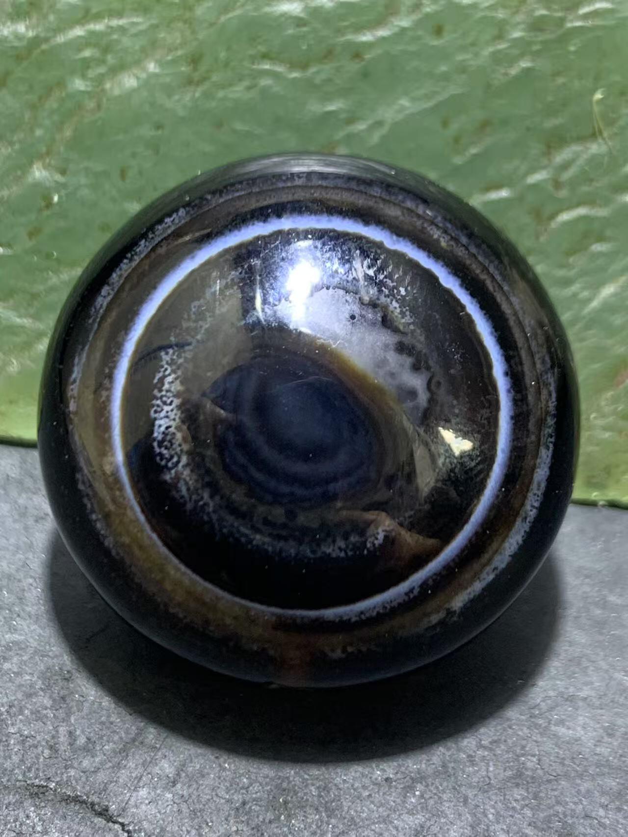 精品天眼纹药师玛瑙手工雕刻太阳花板珠（背云）一颗。