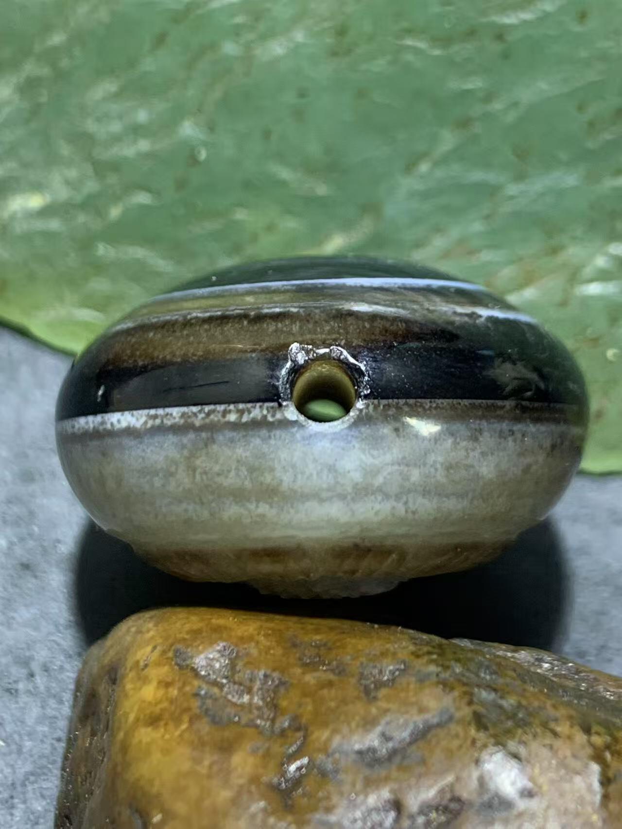 精品天眼纹药师玛瑙手工雕刻太阳花板珠（背云）一颗。