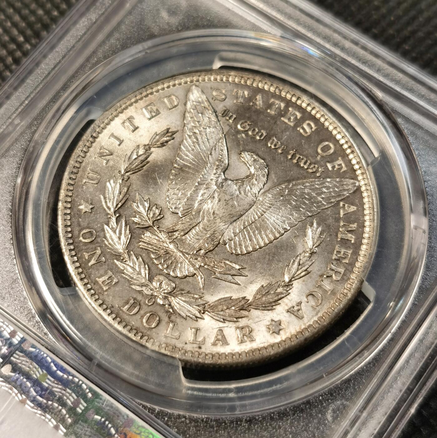  甄臻铺-世界币章拍卖（第26期），送拍享返佣金等优惠多多 PCGS-MS63 1900年O版摩根，金彩包浆，不多见的年份
