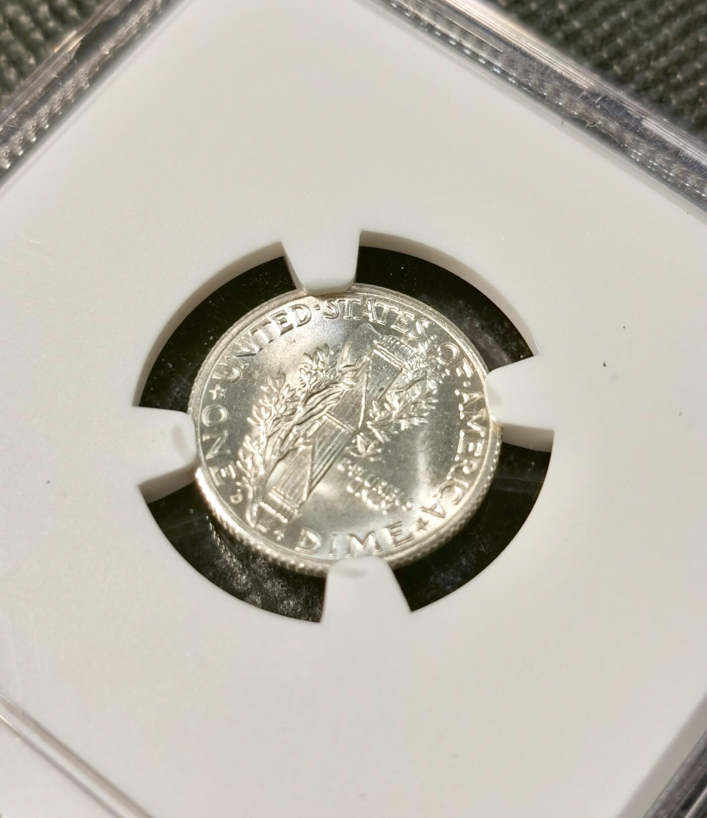  甄臻铺-世界币章拍卖（第26期），送拍享返佣金等优惠多多 NGC-MS65FB 美国1940年D版小飞侠，高分少见，国内少见FB后缀