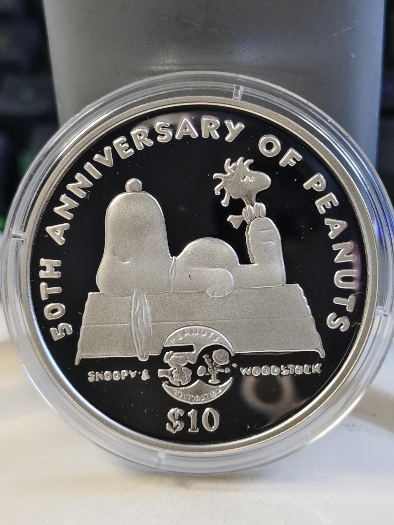 第168期拍卖【长期征集拍品】 纽埃2000年卡通人物史努比50周年精制纪念大银币，925银，发行10000枚